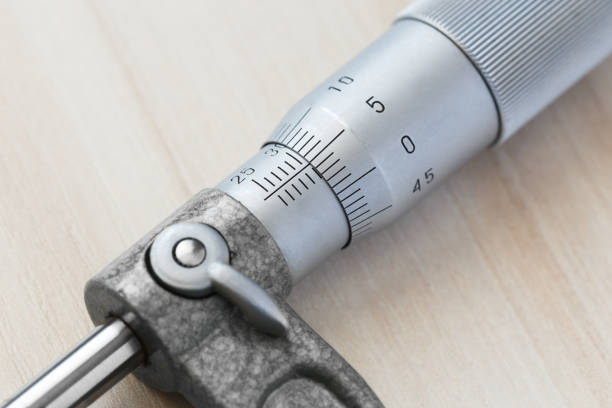 Vernier scale micrometer Vernier rotating scale of a precision micrometer. Macro photography. micrometer screw gauge stock pictures, royalty-free photos & images