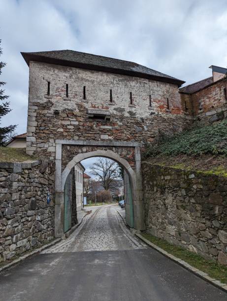 istock Old stone building with an arched entranceway in Linz, Austria 2022173071