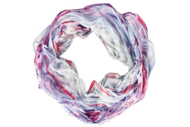 Overhead shot of blue and crowded red silk thread abstract background.