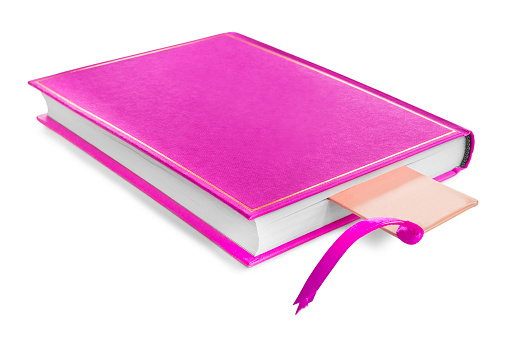 Book with blank pink gilded cover and a bookmark lying on white background