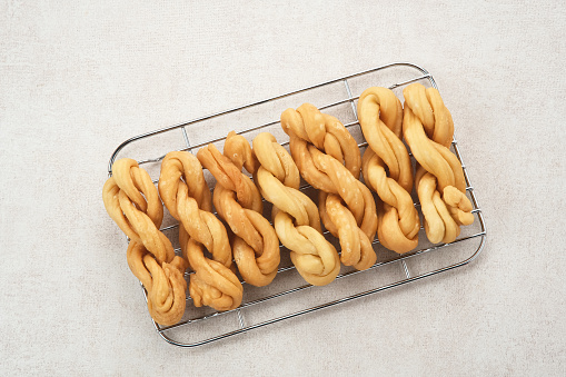 Kue Tambang or Untir untir is a traditional Indonesian cookies made from wheat flour, sugar, eggs