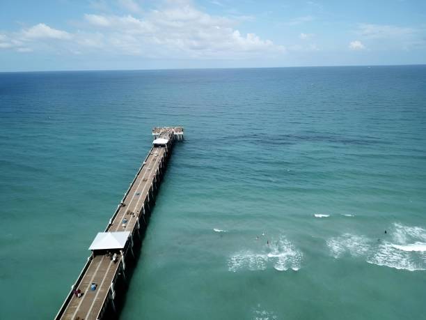 istock Aerial view of beach time on Juno Pier 2022220518