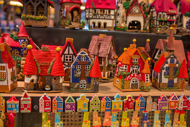 Prague, Czech Republic - October 7, 2023: Creative design of a souvenir shop in Prague. Fairy-tale houses in the window of a tourist shop. Souvenir shops offer tourists excellent gifts.