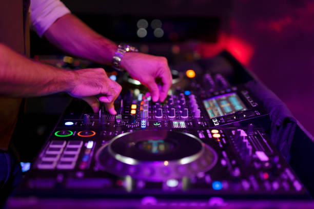 istock DJ spend night time for work at night club. 2022261004