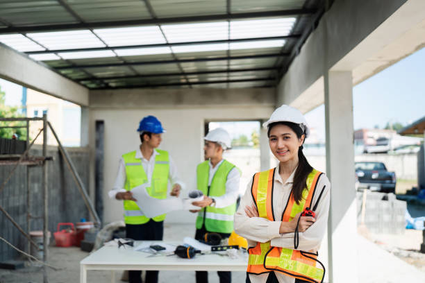 istock Portrait, construction worker and manager with an engineer woman at work in her architecture office 2022336309