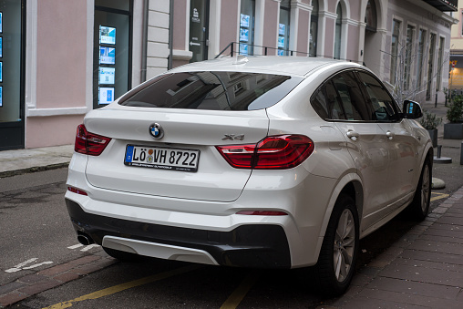 Mulhouse - France - 18 february 2024 - rear view of BMW X4 parked in the street