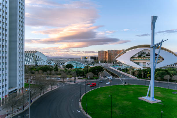 Valencia, Spain - February 08, 2024: The most touristic attraction in the city.  Famous futuristic buildings (Hemisferic and Palau de las artes Reina Sofía), by Santiago Calatrava in the City of Arts and Sciences, the work of Leiko Ikemura