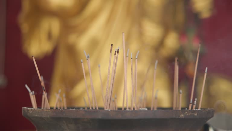 Old historical metal Censer at Buddhist temple, praying in temple, people lights incense and praying