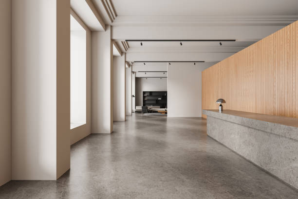 istock White and wooden hotel hall with reception 2022413167