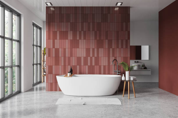 istock White and red bathroom interior with tub and sink 2022419618