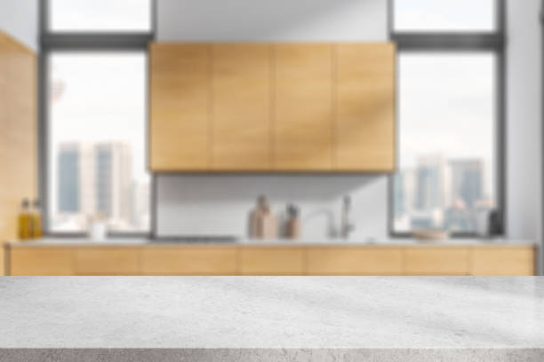 istock Stone counter on background of kitchen interior with panoramic window. Mockup 2022422246
