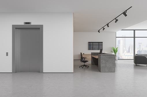 Stylish office reception interior desk, elevator and relax place near window