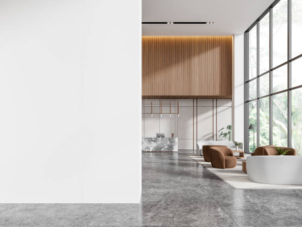 istock Office reception interior desk and waiting space, panoramic window. Mock up wall 2022426530