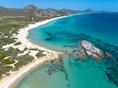 Scoglio di Peppino beach, aerial view, drone, Costa Rei, Muravera, Castiadas. Sardinia. Beach with white sand and crystal clear waters and the famous rock