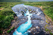 Bruarfoss waterfall flowing from Bruara river on wilderness in summer at Iceland