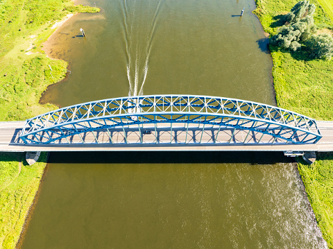 Oude IJsselbrug or Katerveerbrug bridge over the river IJssel near the city of Zwolle in Overijssel, The Netherlands. Aerial drone point of view.