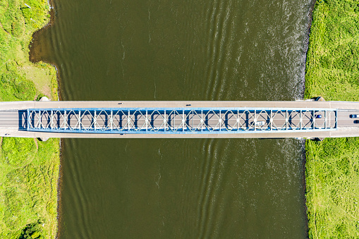 Oude IJsselbrug or Katerveerbrug bridge over the river IJssel near the city of Zwolle in Overijssel, The Netherlands. Aerial drone point of view.