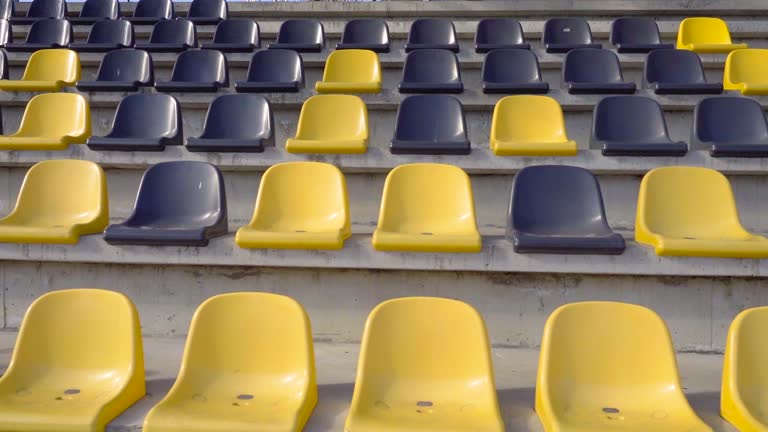 Empty plastic seats in the stadium.