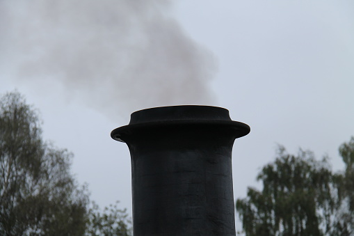 The Smoking Funnel of a Vintage Steam Railway Engine.