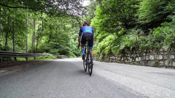 istock Bicycle racing cyclist on asphalt road 2022484885