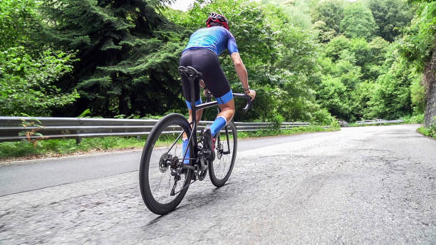 istock Bicycle racing cyclist on asphalt road 2022486471