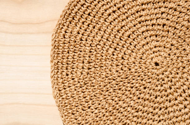 Close-up of a raffia napkin. Crochet. Eco material for handmade work.