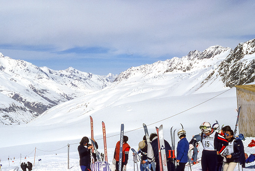 Val Senales, South Tyrol, Italy - March 1981: a group of skiers are preparing to tackle the ski slopes of the Grawand glacier, in Val Senales.