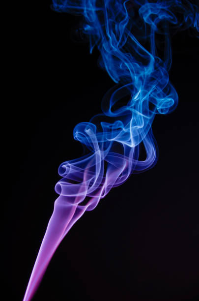 istock Movement of color smoke isolated on black background. 2022555907