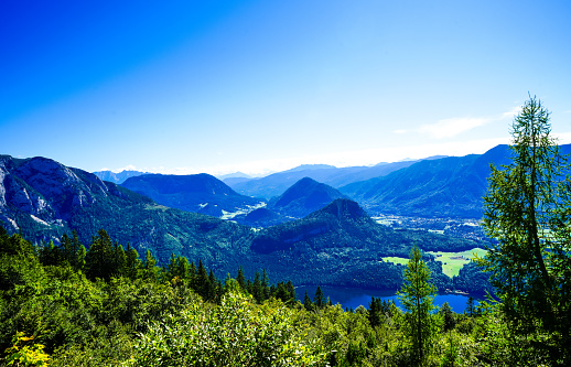 View of the surrounding landscape at the Loseralm near Altaussee in the Salzkammergut in Austria. Nature with panoramic views of the mountains on the Loser Alm in Styria.