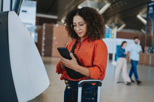 istock Woman checking in at the airport 2022564597