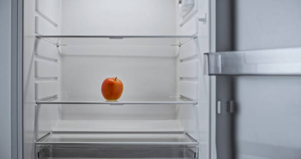 istock Close-up of red apple in fridge 2022570113