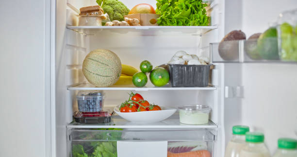 istock Fridge stocked with fresh vegetables and fruit 2022570141