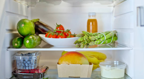 istock Fridge stocked with fresh vegetables and fruit 2022570153