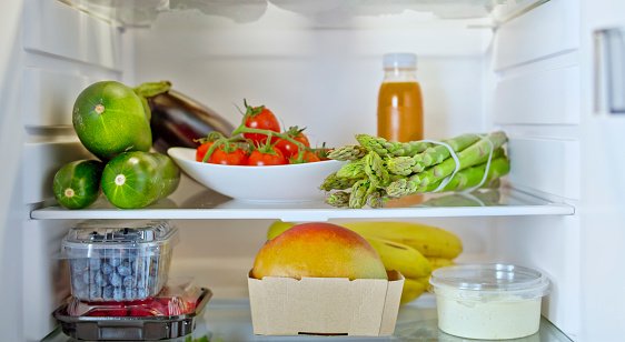 Refrigerator filled with fresh fruit and vegetables.