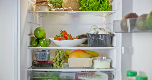 istock Fridge stocked with fresh vegetables and fruit 2022570701