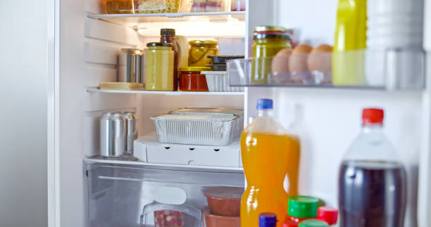istock Juice bottle and food stacked in fridge 2022571238
