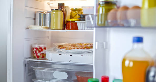 istock Juice bottle and food stacked in fridge 2022571246
