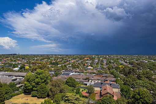 Aerial view severe thunderstorm over Melbourne Eastern Suburbs, on Tuesday Feb 13, 2024. This severe storm caused havoc in the city and surrounding suburbs and nearby regions with widespread damage to the power network causing extensive blackouts. It really was the calm before the storm with the sun shining prior to the storm lashing the suburbs.