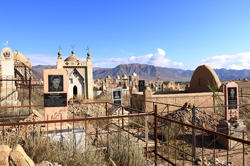 Kochkor, Kyrgyzstan, central asia - August 21 2023: Panorama view to muslim cemetery Semiz Bel in Naryn region