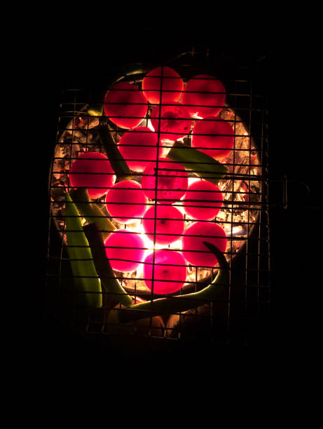 barbecue, night, tomato, pepper, cooking on coals stock photo