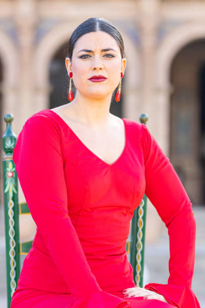flamenco dancer in a typical flamenco dance dress - flume stock-fotos und bilder