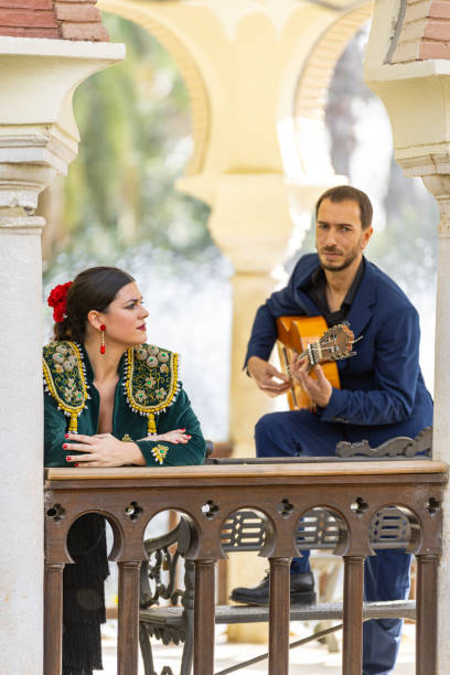 flamenco dancer in a typical flamenco dance dress - flume stock-fotos und bilder