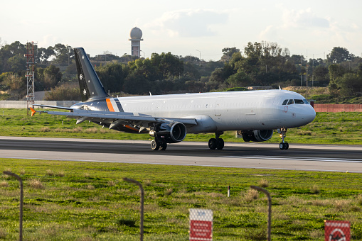 Luqa, Malta - January 22, 2024: Titan Airways Malta Airbus A321-211(P2F) (REG: 9H-ZTA) on an early morning arrival.