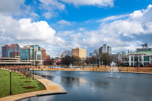 Huntsville, Alabama, USA park and downtown cityscape.