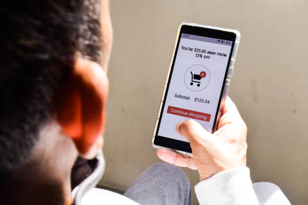 istock Upselling sales techniques in E-commerce concept to encourage customers to spend more money. Person using mobile applications to purchase items online. 2022711693