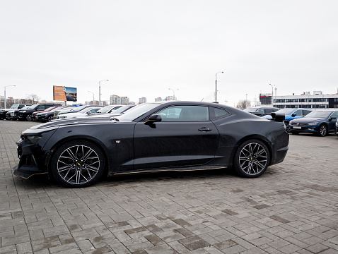 Minsk, Belarus, February 19, 2024 - Chevrolet sports fast car with tuning on parking
