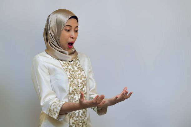 istock Young Muslim woman posing in White background studio for Ramadan or Eid Concept 2022761493