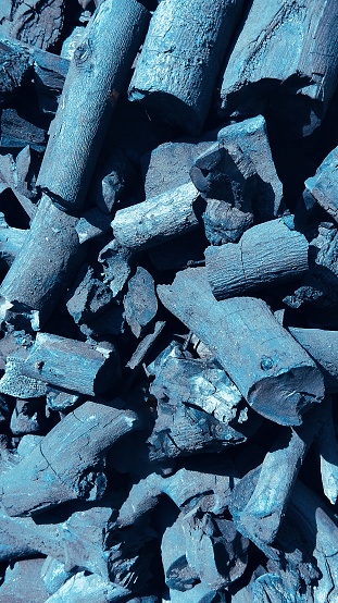 Charcoal or Wood Coal Heap: A Natural Fuel Source for Grilling and Heating, image stock image
