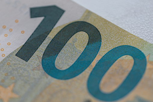Paper bill of 100 euros, macro. Business and finance, concept. 100 euros money