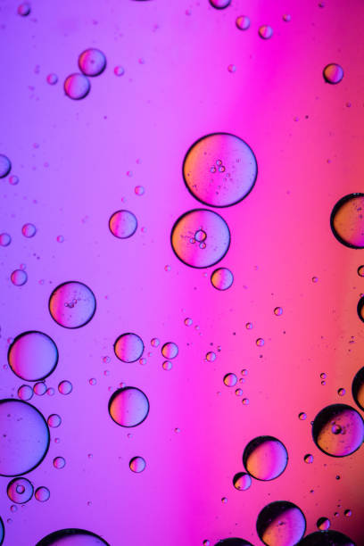 istock Abstract oil drops in a water 2022804919